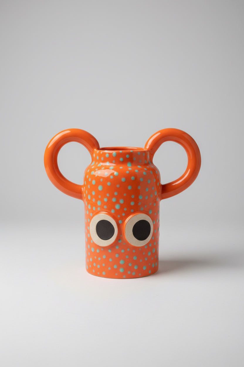 Petit vase orange à pois vert