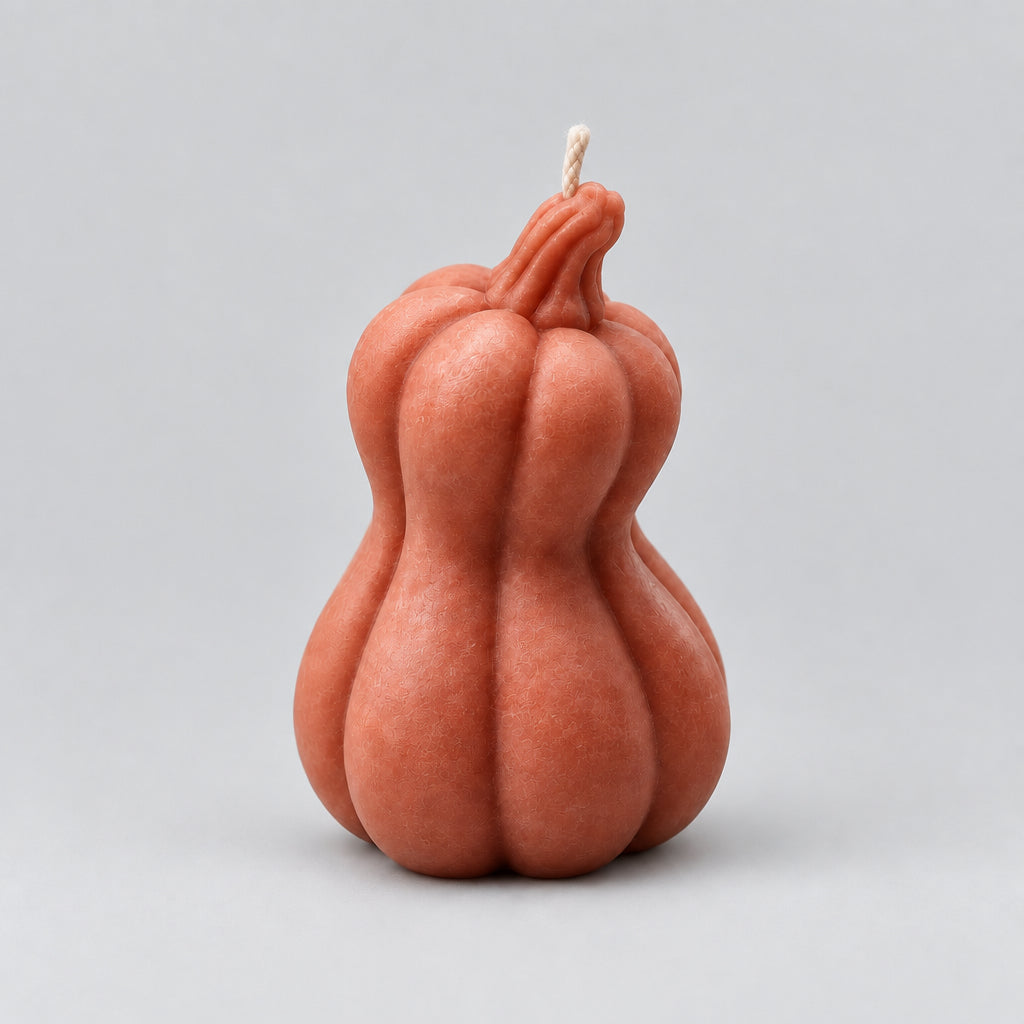 Bougie courge penchée crème et orange senteur automne gourmand